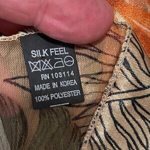 “Silk Feel” Scarf Made In Korea Polyester Gold, Black, Orange  Animal pattern